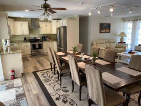 Waterfront Cape Paradise with heated pool, boats, bikes